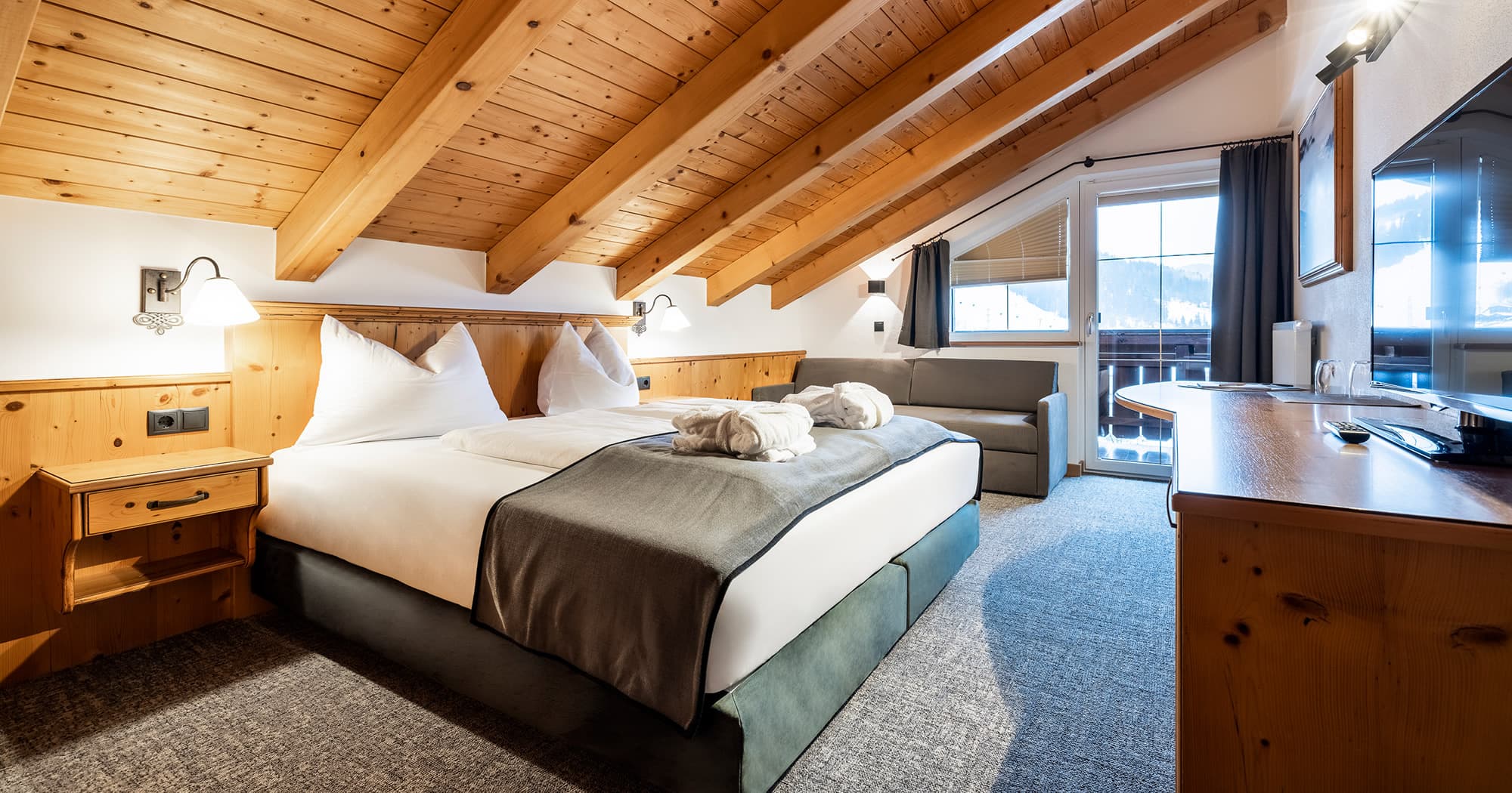 Wohnen im 4-Sterne Hotel Bergzeit in Flachau nahe dem Achterjet in Snow Space Salzburg