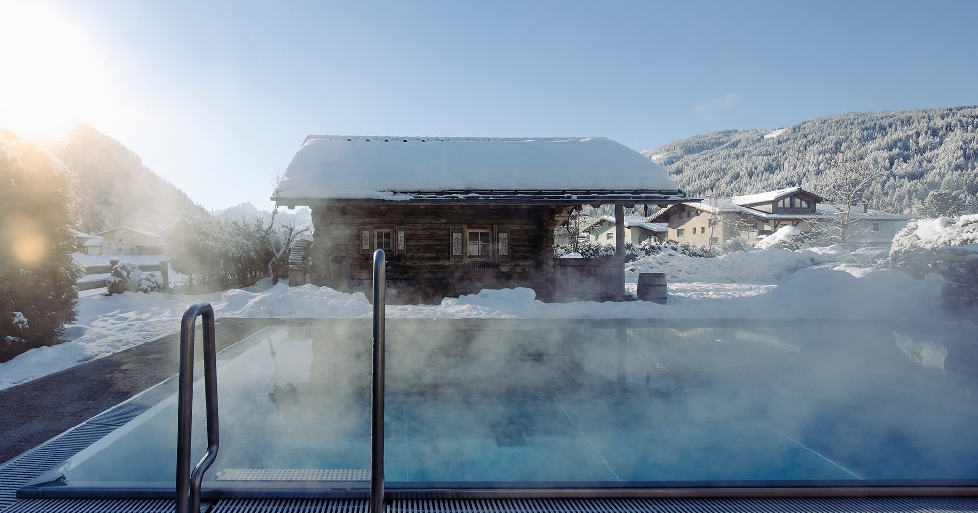 4-Sterne Hotel Bergzeit in Flachau mit beheiztem Freibad im Winter