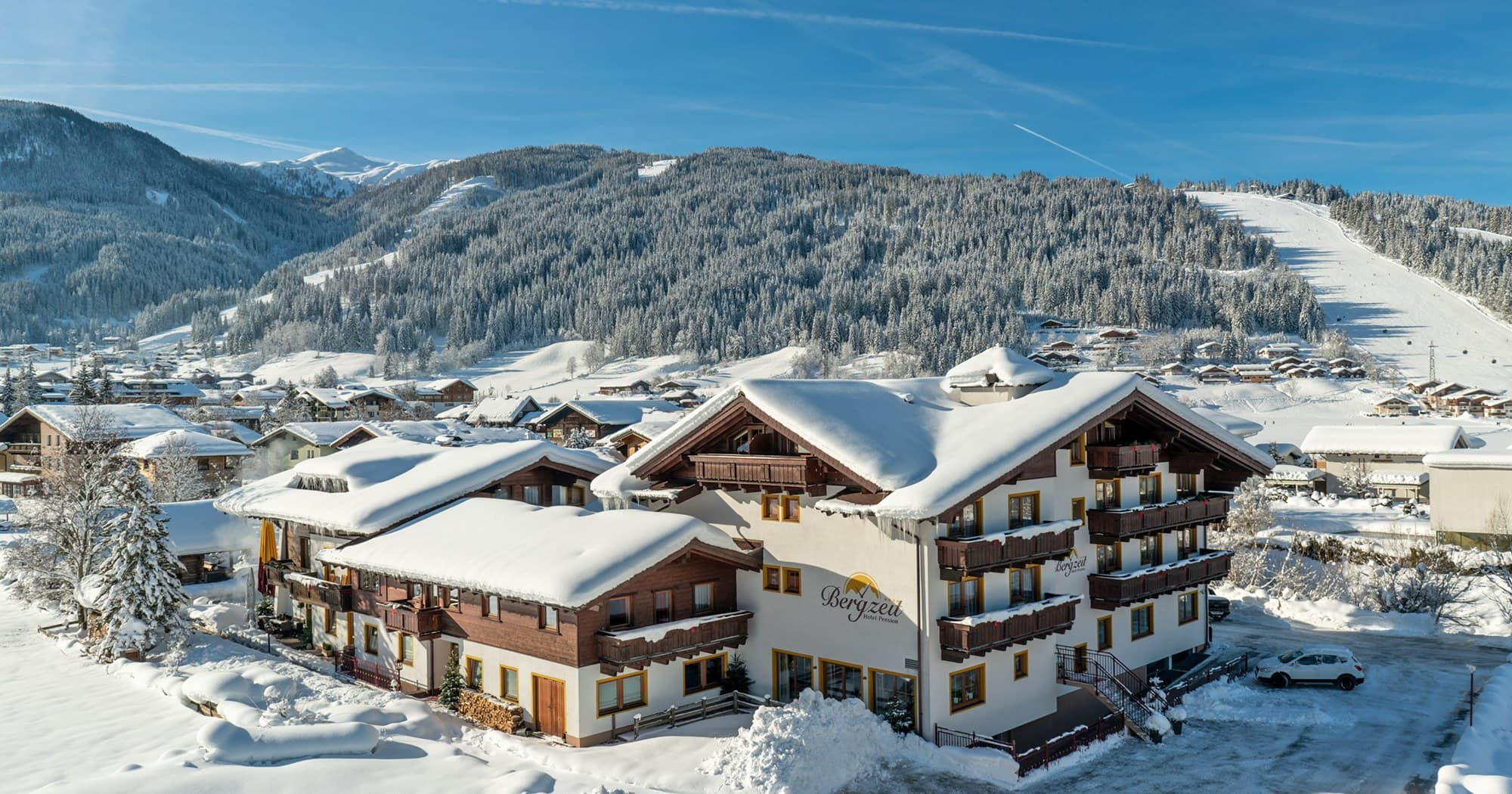 Wohnen im 4-Sterne Hotel Bergzeit in Flachau nahe dem Achterjet in Snow Space Salzburg